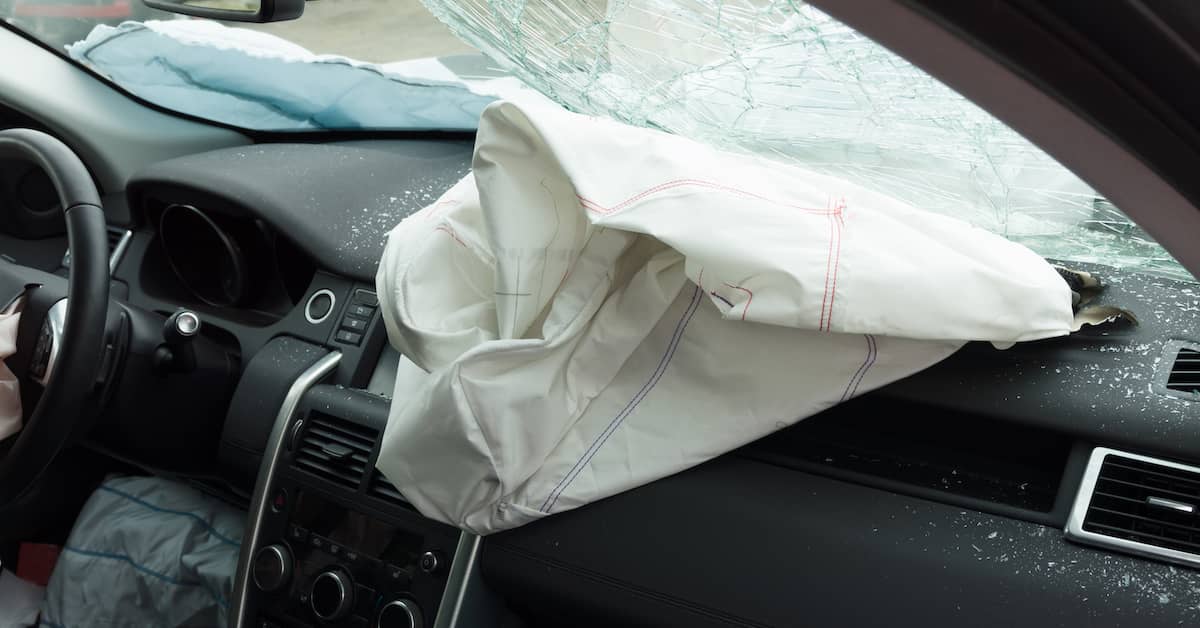 a deployed passenger side airbag | Roberts Wilson, P.A.