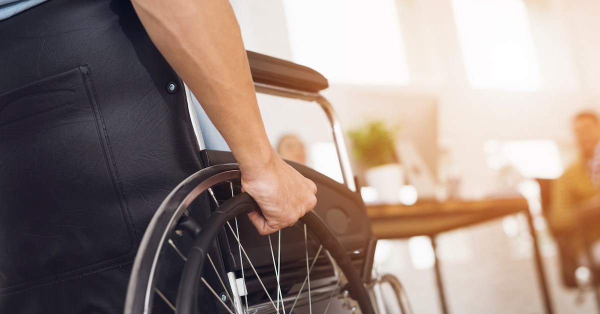 Person in wheelchair awaits SSDI benefits | Roberts Wilson, P.A.